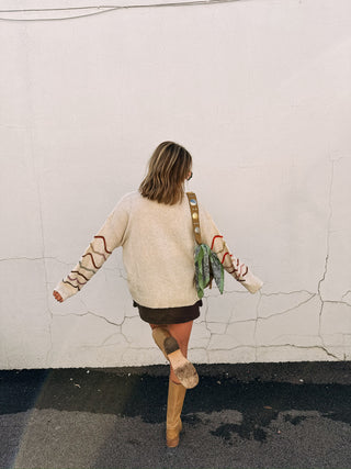 draw the line sweater