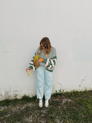 cabin fever cable knit sweater