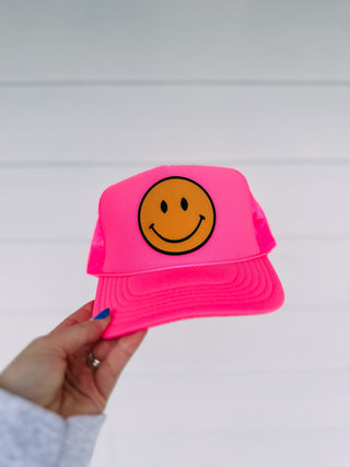 happy smiley pink trucker hat