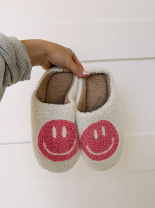 pink smiley slippers