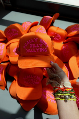 ETTA OG | dilly dallying trucker hat - orange