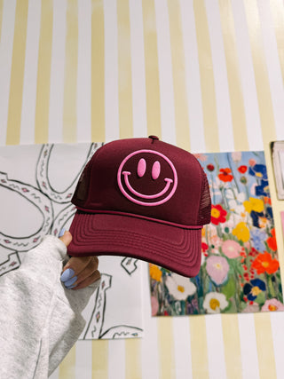 ETTA OG | puff smiley trucker hat - burgundy / pink