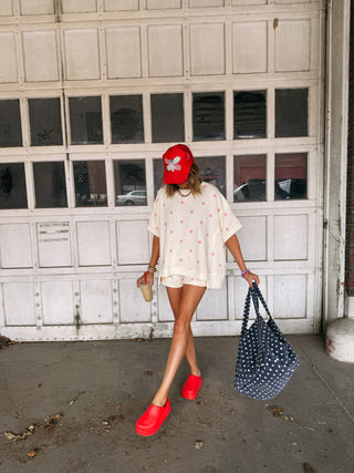 powder blush polka dot top