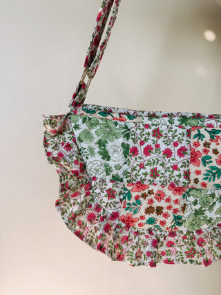 gardenia ruffle crescent crossbody