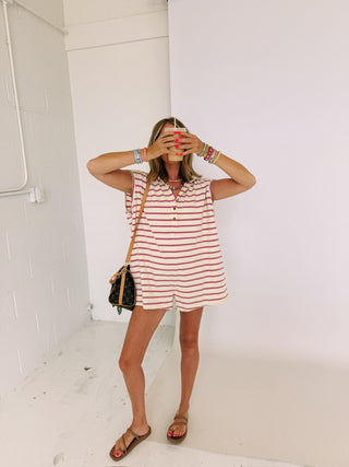 reel it in polo romper