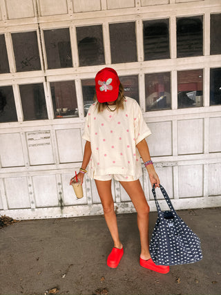 powder blush polka dot top