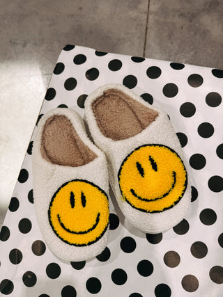 yellow smiley slippers