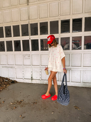 powder blush polka dot top