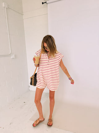 reel it in polo romper
