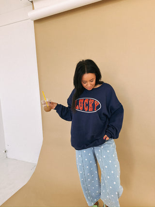 ETTA OG | star studded lucky sweatshirt - navy / red.