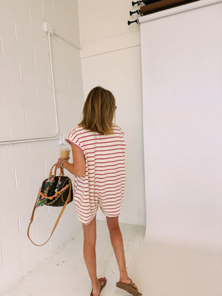 reel it in polo romper