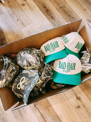 bows + camo trucker hat