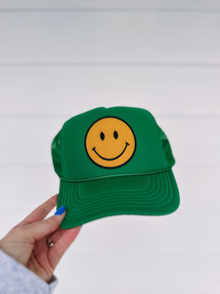 happy smiley green trucker hat