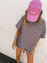 brown / blue top