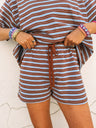 brown / blue shorts